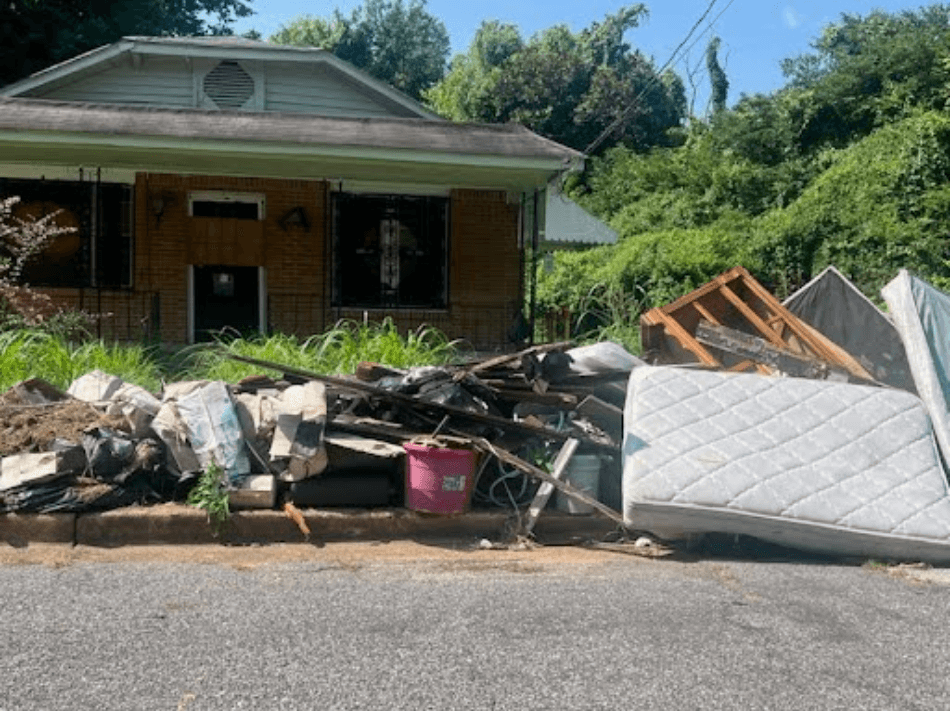 Discarded trash pile on West Waldorf Avenue in South Memphis: Mr. Otha Farris, Jr.